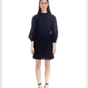 Beautiful dress never worn with tags still on! Fits to size!